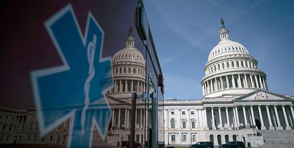 An image of the Capitol building is reflected in the surface of an ambulance. 