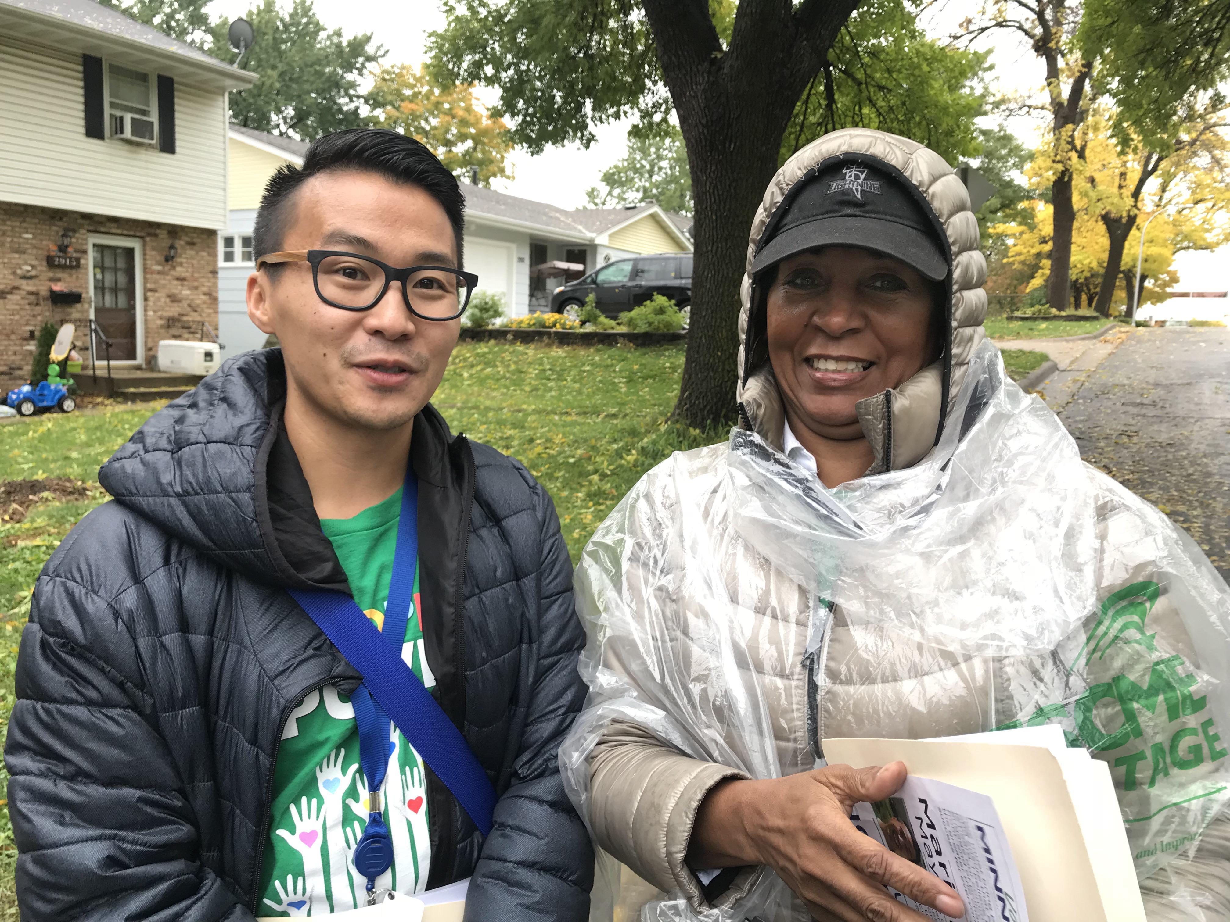 Member Organizers David Yang (Local 34) and Starr Suggs (Local 3142) knock doors in Richfield, Minnesota