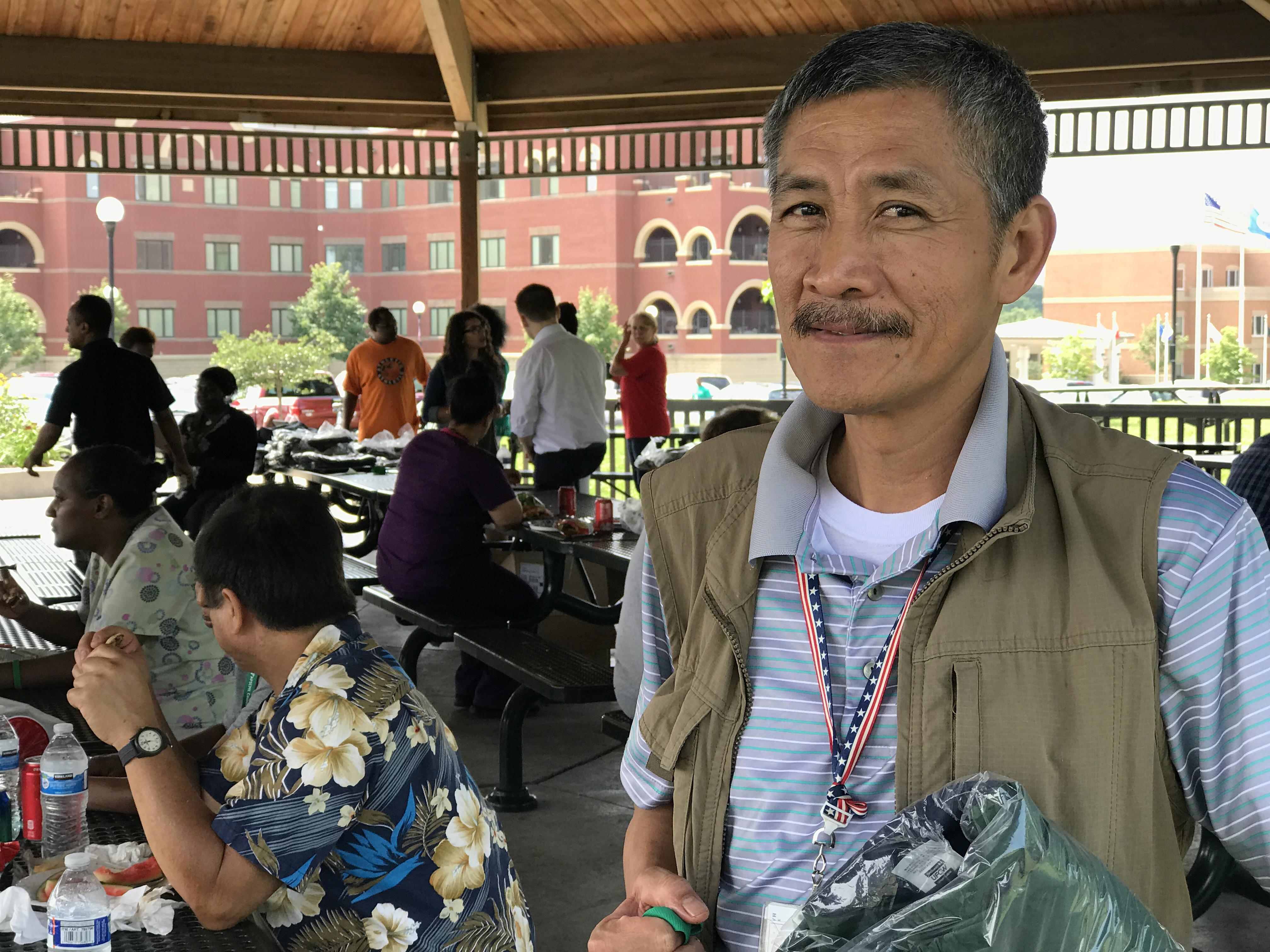 Leon Visperas proudly holds his new PEOPLE jacket.